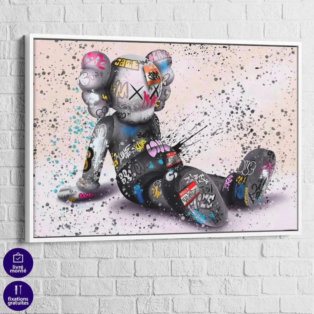 tableau kaws le rêveur assis avec cadre blanc