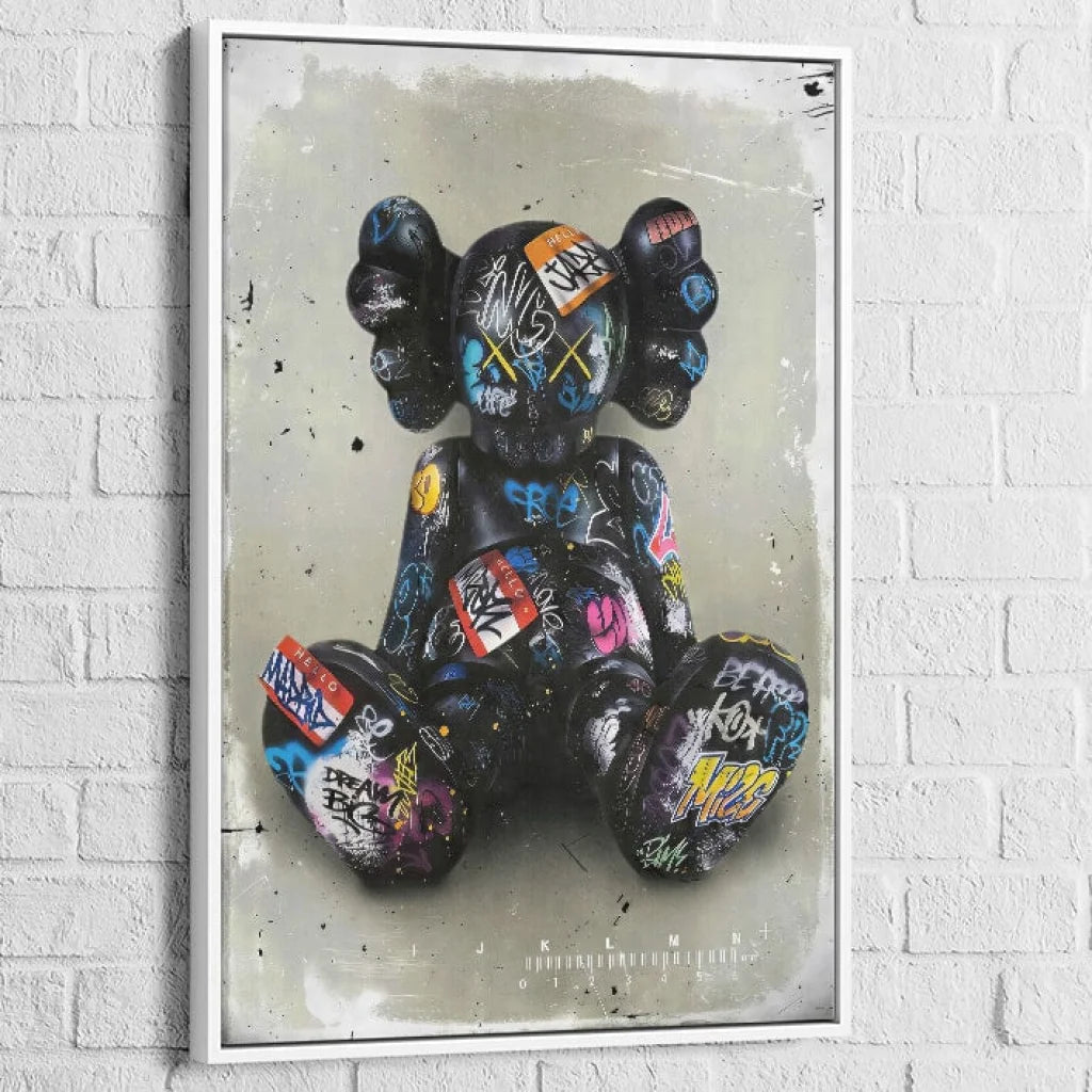 tableau kaws black pop avec cadre blanc