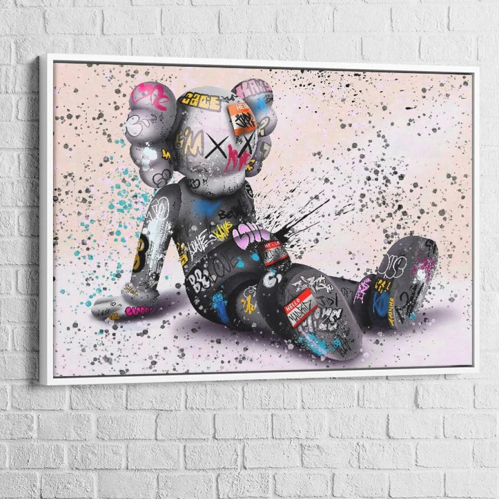 tableau kaws le rêveur assis avec cadre blanc 