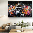 Tableau moderne avec tête de gorille sur fond graffiti abstrait


